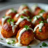 Easy Baked Buffalo Chicken Meatballs with Blue Cheese Drizzle