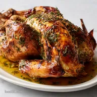 Juicy roasted turkey breast with garlic and herb butter sauce