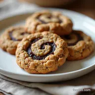 Chewy PB J Oatmeal Cookies with Jam Swirl